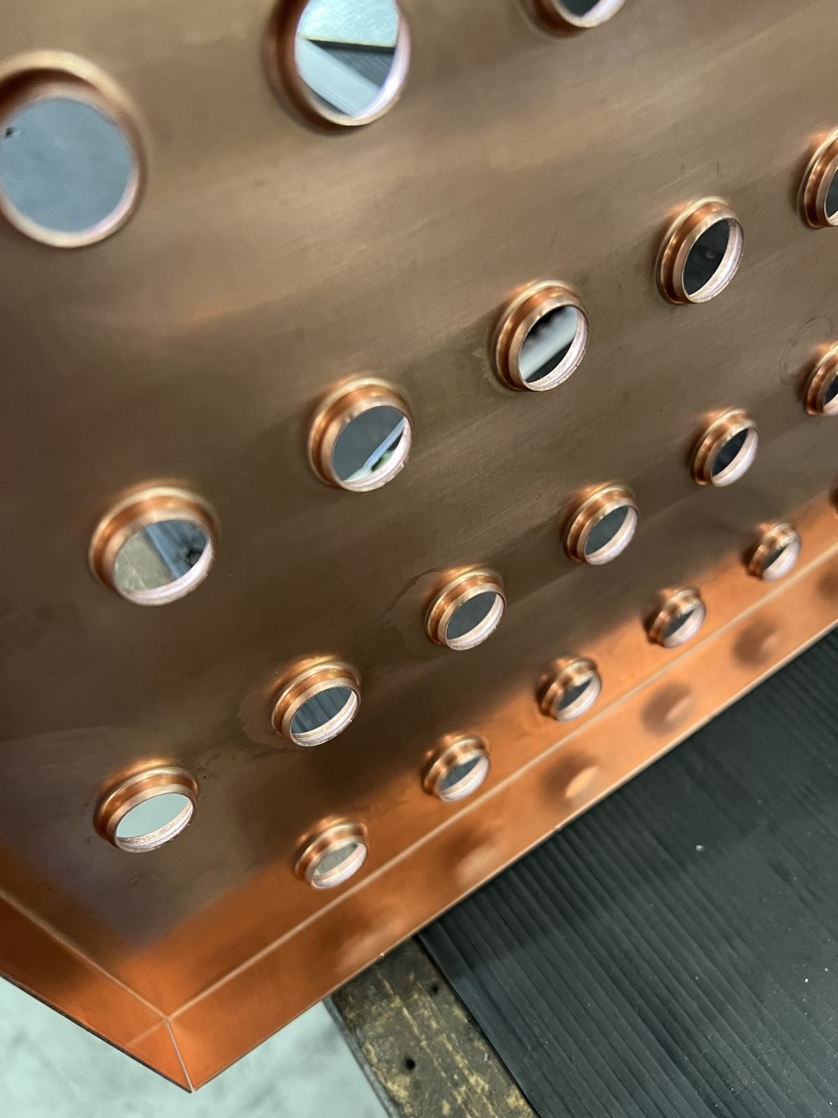 Close-up of precision copper fabrication by Programmed Engineering Services Australia