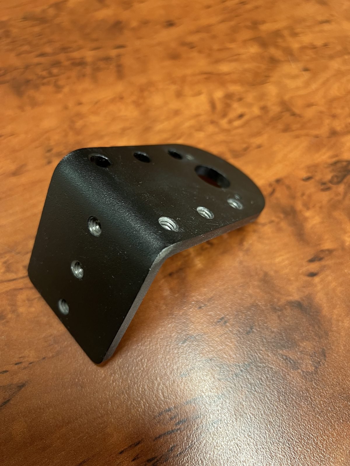 Black powder-coated L-bracket